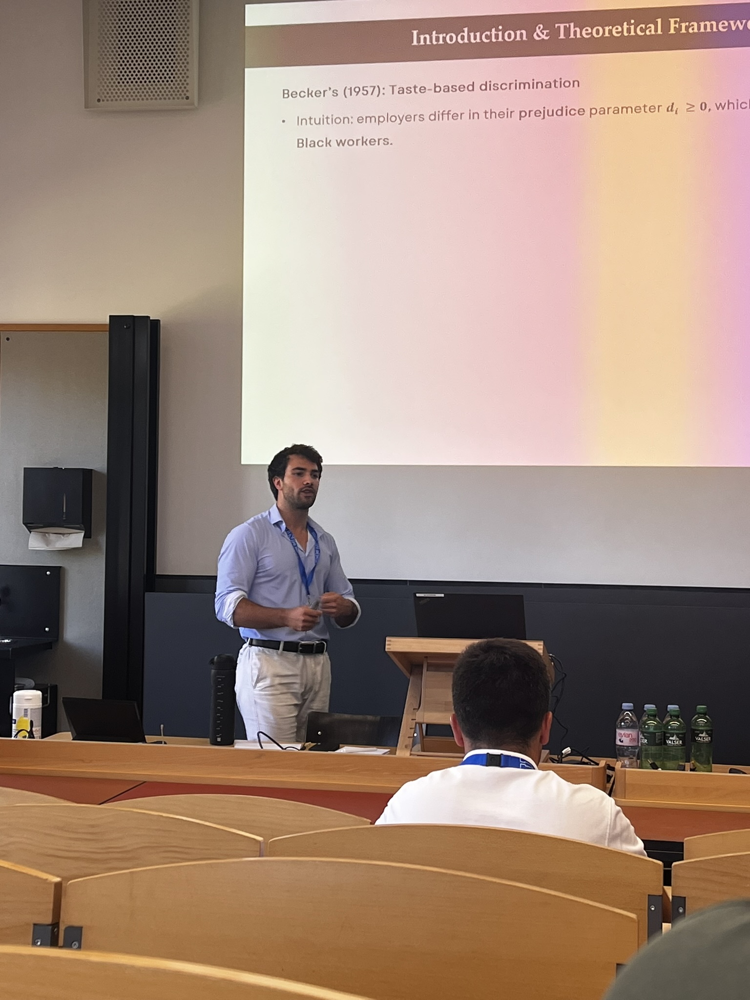 Manuel Arrigo presenting research at a conference